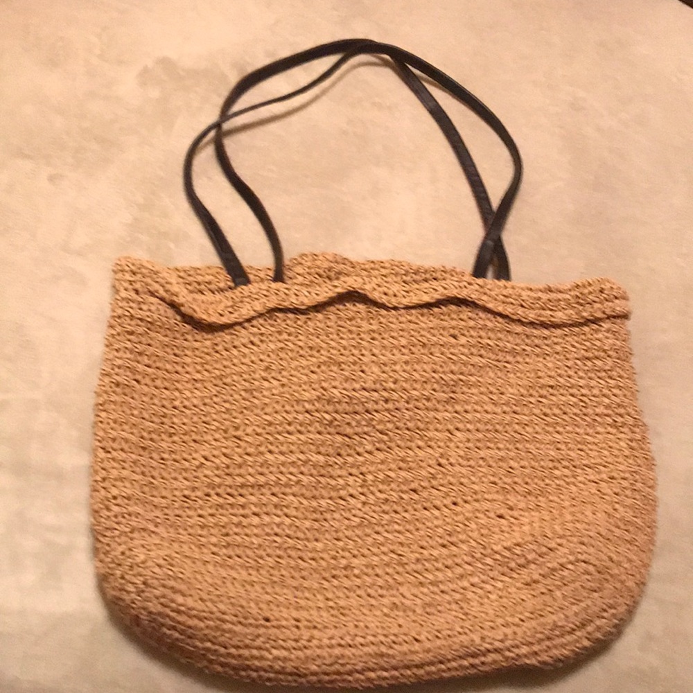Bag with leather straps